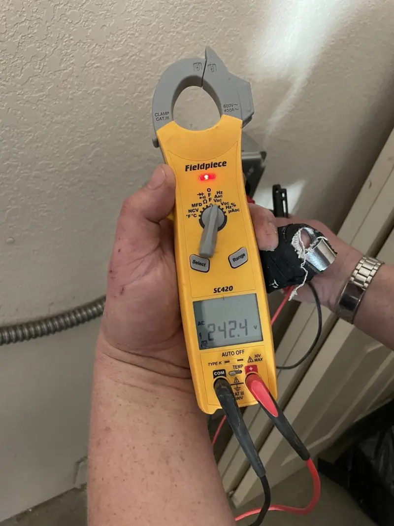 Voltage testing with clamp meter during Aluminum Wiring Replacement in Camanche